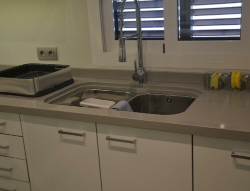 New kitchen in Glossy White and stainless handles